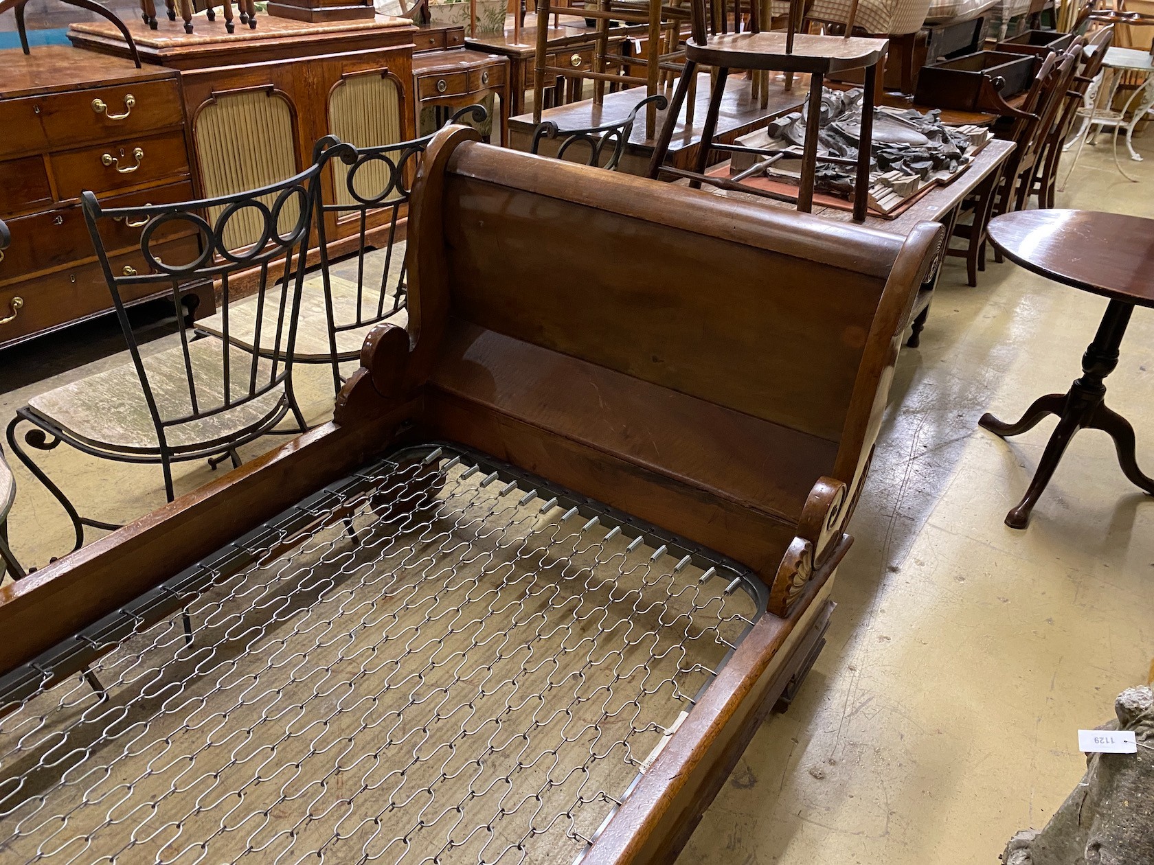 A 19th century Continental carved mahogany single sleigh bed, width 109cm, length 260cm, height 94cm